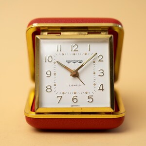 Horloge de voyage miniature - L'Epée - Laiton - Seconde - Catawiki