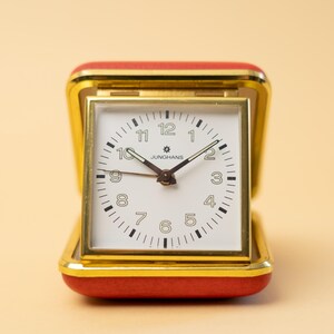 Sold at Auction: Clocks, JUNGHANS TRAVEL ALARM CLOCK, A