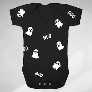 May include: Black baby onesie with white ghost and "BOO" print.