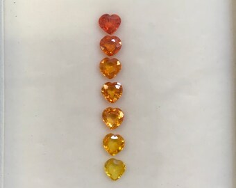 5mm 7 Stones Heartshape Orrenge to yellow Sapphires  Beautiful Set