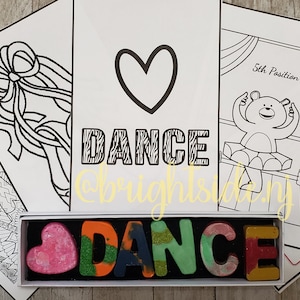 May include: A set of four coloring pages featuring a ballerina, a heart with the word "DANCE" in zebra print, a bear in a tutu, and a word search puzzle. The set also includes a box of colorful crayons shaped like the word "DANCE".