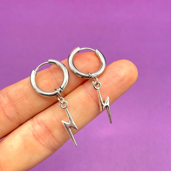 Huggie earring with charm | Silver huggie hoops, lightning bolt charm | fun earrings uk, funky earrings, trendy earrings, huggie hoops uk