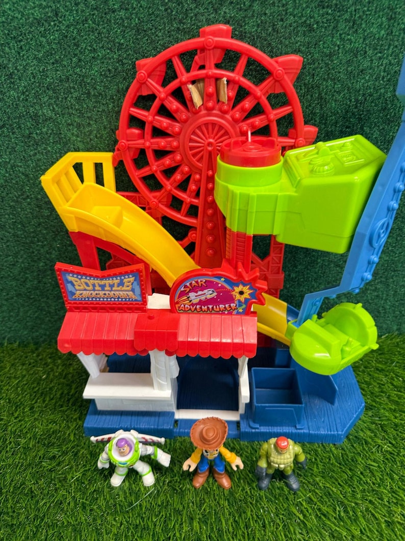 Zestaw do zabawy Imaginext Toy Story Carnival Disney Fisher Price z figurkami Buzza i Woody'ego zdjęcie 5