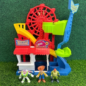 Zestaw do zabawy Imaginext Toy Story Carnival Disney Fisher Price z figurkami Buzza i Woody'ego zdjęcie 1