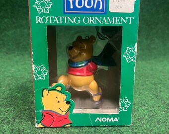 Adorno navideño giratorio vintage de Winnie the Pooh, 1989