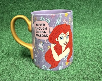 Taza de cerámica de la Gruta de Ariel de Disney Store, La Sirenita
