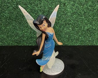 Figura coleccionable contemporánea de Periwinkle de las Hadas Disney, con vestido azul y alas.