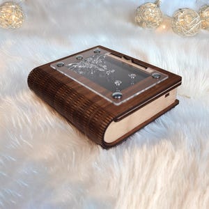 Quebra-cabeça artesanal 'A Canção do Dragão' - Abra o livro!