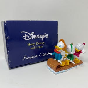 Vintage Disney Ornaments Huey, Dewey, and Louie on a Sled President&#39;s Edition 2002