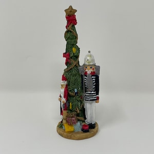 Vintage DTD Norfolk Santa Claus with Oversized Nutcracker, Tree and Presents Holiday Figurine