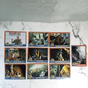 Vintage JP Topps Trading Cards Lot of 10 Jurassic Park Movie Cards, About The Scene Cards, and Extra Movie Facts Lot #11