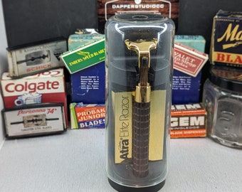 Rasoio a cartuccia vintage Gillette 24K Gold ATRA Elite degli anni '80 con lame e istruzioni Nuovo nella confezione