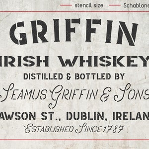K&ouml;nnte beinhalten: Schwarz-wei&szlig;es Schablonen-Design f&uuml;r ein Whiskey-Etikett. Der Text lautet "GRIFFIN IRISH WHISKEY DISTILLED & BOTTLED BY SEAMUS GRIFFIN & SONS DAWSON ST., DUBLIN, IRELAND ESTABLISHED SINCE 1787".