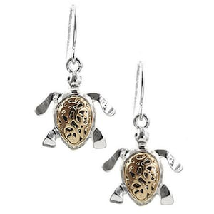 May include: A pair of silver dangle earrings featuring a turtle design. The turtle's shell is made of gold and has a detailed, intricate pattern.