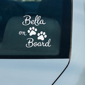 Dog paws with name sticker for the car dog on board