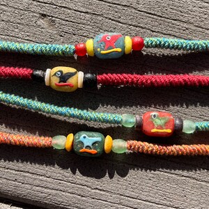 Phoenician glass bird beads, Krobo African glass beads, Tibetan hand twisted cotton cords, macrame necklace choker