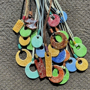 SALE - Fun ceramic textured necklace tree leave fish people bamboo nature