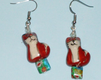 Foxes in the Garden: earrings with ceramic foxes and millefiore glass beads