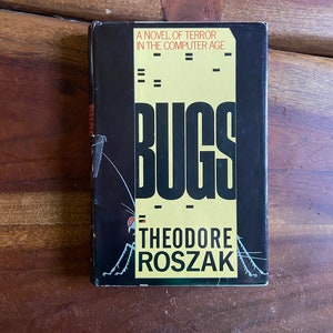 May include: A black and yellow paperback book titled "Bugs: A Novel of Terror in the Computer Age" by Theodore Roszak.