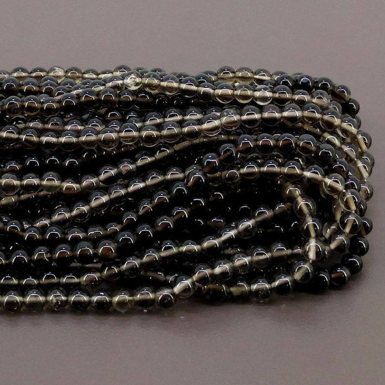 Total 19 Strands of 14 Inches SKU#20215 Full Hank of 7-12.5mm Smoky Quartz Smooth Round Natural Gemstone Beads CLOSEOUT SALE