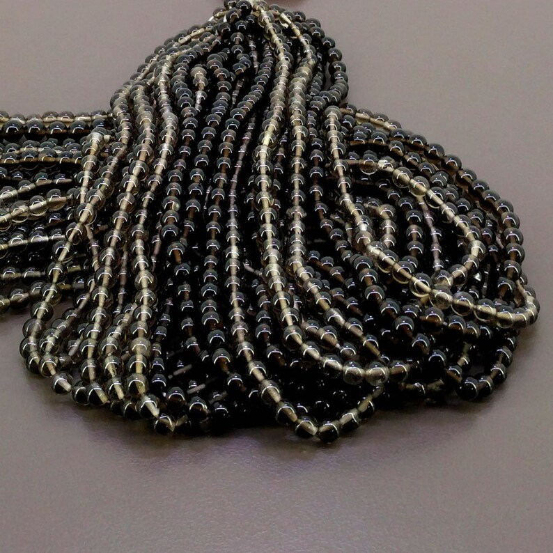 Total 19 Strands of 14 Inches SKU#20215 Full Hank of 7-12.5mm Smoky Quartz Smooth Round Natural Gemstone Beads CLOSEOUT SALE