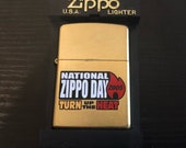 Zippo National Zippo Day quot Turn Up the Heat quot Limited Edition Gold Dust Lighter (Zippo, 2005)