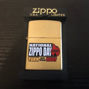 Zippo National Zippo Day &quot;Turn Up the Heat&quot; Limited Edition Gold Dust Lighter (Zippo, 2005)