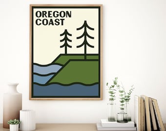May include: A framed art print featuring a minimalist landscape design. The artwork displays the text "OREGON COAST" above stylized trees, a green hill, and blue water. The print has a cream-colored background and a dark green border.