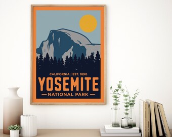 May include: A framed Yosemite National Park poster. The poster features a mountain, trees, and a yellow sun against a blue sky. The text "YOSEMITE NATIONAL PARK" is displayed in orange and white. The poster is in a wooden frame.