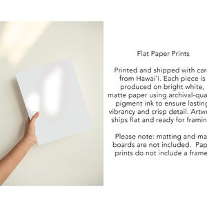 a person holding up a piece of paper