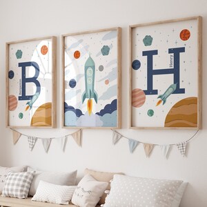 Space wall art set of 3 prints on white background, with rocket and 2 custom name prints