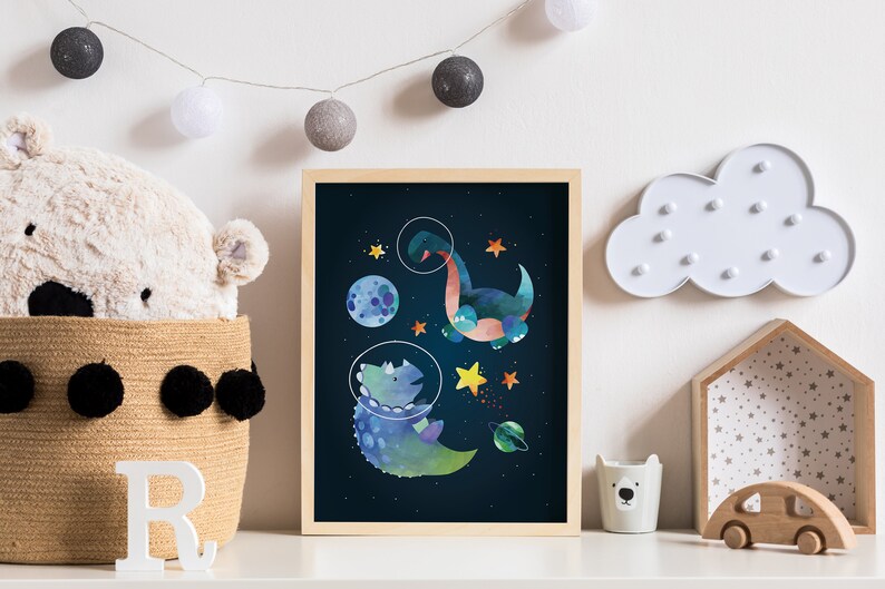 May include: A framed print of two blue dinosaurs in space with stars and planets. The dinosaurs are in a watercolour style.