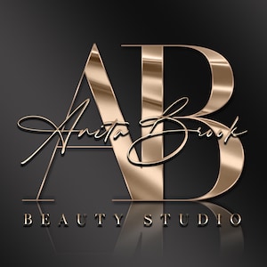 May include: Gold metallic letters "A" and "B" with a gold metallic script signature reading "Anita Brook" below. The letters are outlined in black and the text "BEAUTY STUDIO" is below the signature.