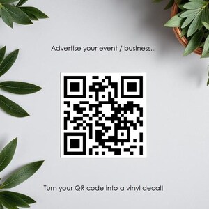 May include: A black and white QR code is displayed on a light grey background. The text "Advertise your event / business..." is above the QR code. Below the QR code, the text reads "Turn your QR code into a vinyl decal!"