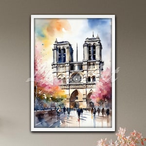 Pode incluir: Pintura em aquarela da Catedral de Notre-Dame em Paris, França, emoldurada em branco. A obra de arte apresenta a icônica catedral com suas torres gêmeas, fachada intrincada e um fundo vibrante e colorido. Pessoas caminham em frente à catedral.
