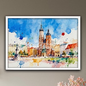 May include: Watercolor painting of a European city square with a large church and buildings. The artwork features a blue sky with colorful paint splatters and is framed in a white border.