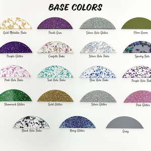 May include: A chart of 18 different colors of glitter and flake finishes for crafting projects. The colors include gold, silver, purple, pink, teal, blue, black, navy, gray, olive green, shamrock green, and confetti.