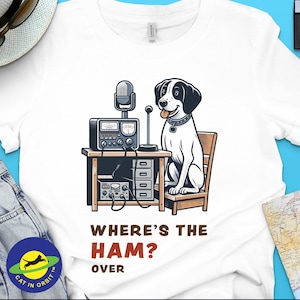 Where&#39;s the Ham, funny and cute dog ham-radio operator talking on the microphone and asking where the Ham is.