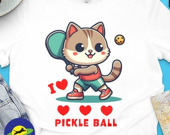 I Love Pickle Ball, Cute Cat playing Pickle Ball, funny graphic t-shirt for lovers of Pickle Ball and Cats