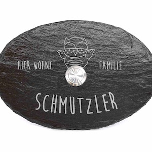 Oval ringklocka med specialgravyr