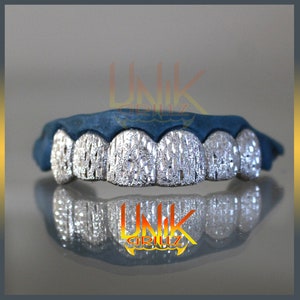 Custom Grillz with Raindrop Cuts by Unik