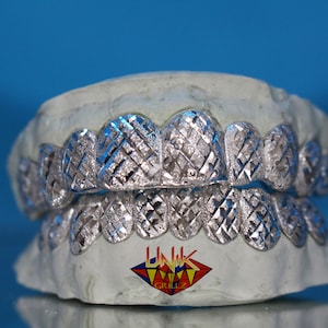 Custom Grillz with Diamond Dust/ Diamond Cuts( perm cuts)