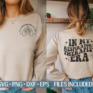 May include: A beige sweatshirt with the text "In My Respiratory Therapist Era" in black with a stylized lung graphic. The text is in a retro font style.