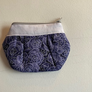 Navy floral clutch