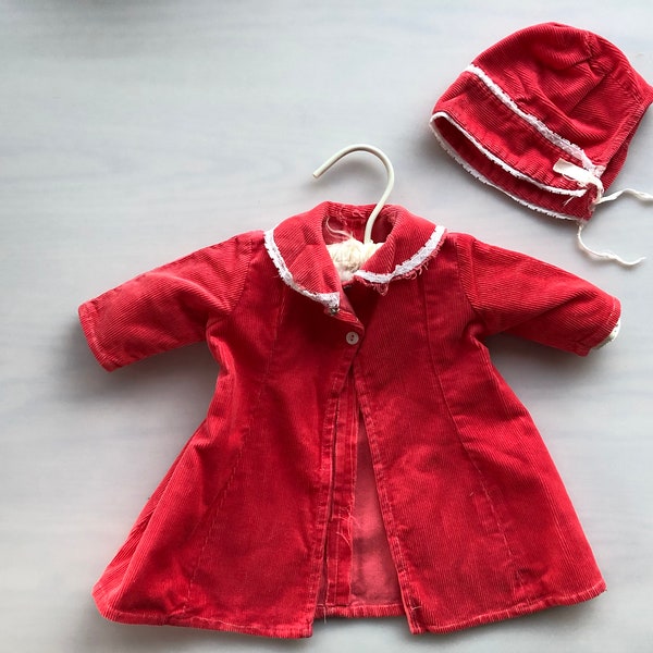 A red hand made corduroy baby girl jacket with matching beret