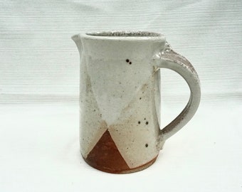 White glazed pitcher