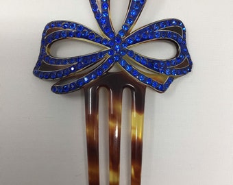 Vintage hair comb with blue Rhinestone brown lucite three prongs