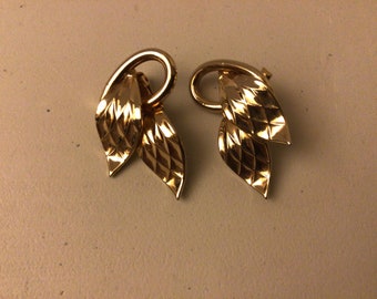 Marino gold tone clip on leaf earrings