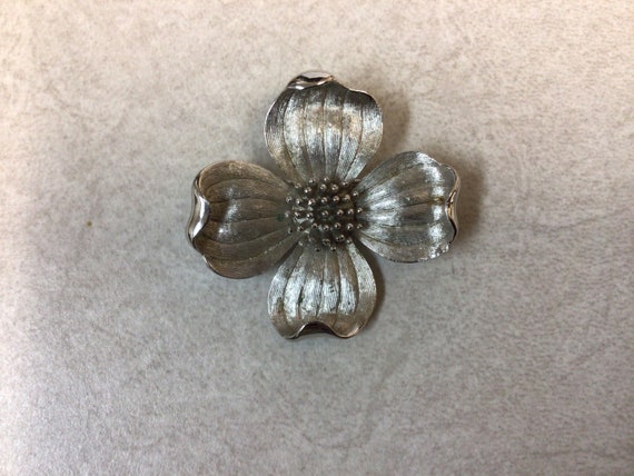 Crown Trifari silver tone flower brooch - image 1