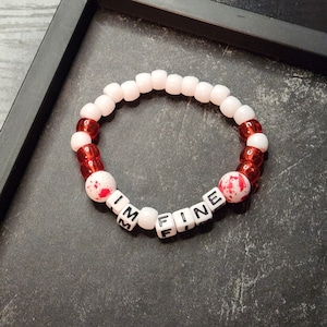 Pulsera con sangre &quot;Estoy bien&quot;